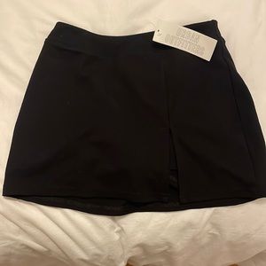 Urban outfitters mini black skirt with shorts underneath!